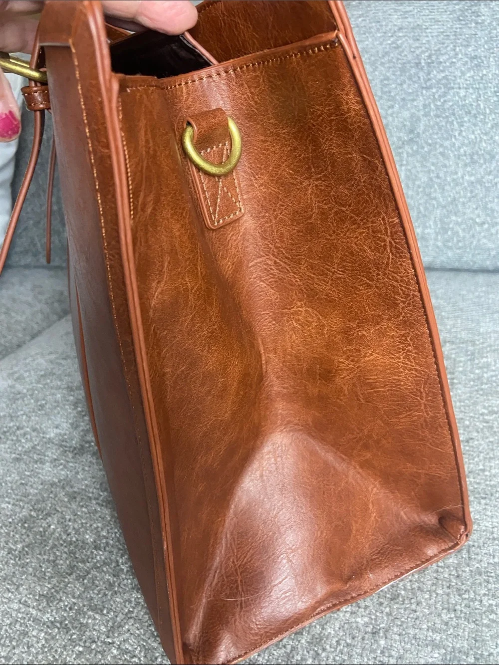 Leather-Textured Tan Tote with Tassel Accent for laptop work